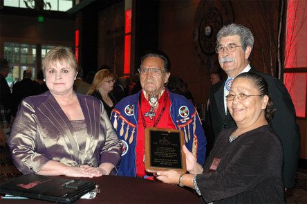 'Organ Lady' and registered nurse Colleen Williams presents Tulalip Tribes Board member Stan Jones Sr.