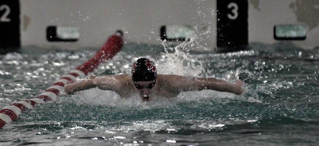 Marysville-Pilchuck senior Spencer Girard performs the butterfly portion during the 200-yard individual medley. Girard posted a state-qualifying time of 1:59.90 while winning the event.