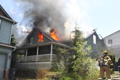 Firefighters respond to a residential fire in the 6800 block of 49th Place NE in Marysville on May 10.