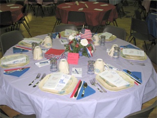 Community members volunteered to set the tables for 'Take a Vet to Lunch' at the Arlington Assembly of God Church Sept. 13