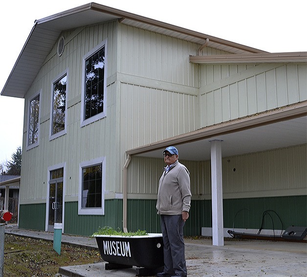 Historical Society president Kenneth Cage stands outside the Marysville museum. The society has started an 'Over the Top' campaign so the museum can be finished by the city's 125th anniversary in March.