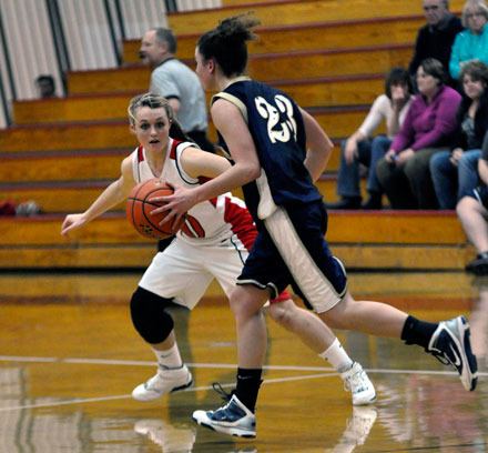 M-P freshman Amanda Klep pressures an Arlington guard.