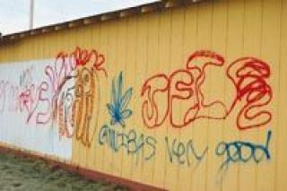 This is the west wall of the former driving range at 67th Avenue NE and Grove Street.  The site now houses the Marysville School Districts SHOPP home schooling center