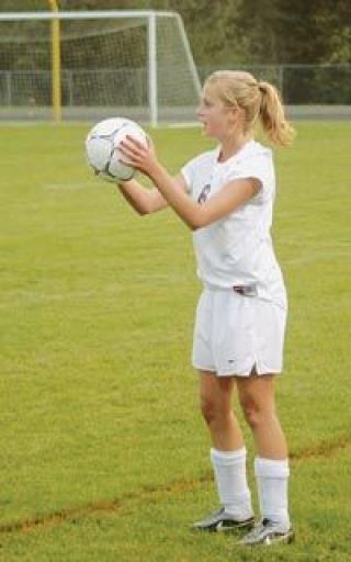 Junior defender Katherine Dietz finds an open teammate before taking a throw-in against South Whidbey.