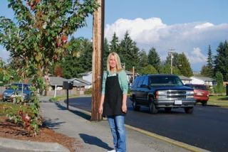 Barista Michelle Adamski watches traffic flow past her Grove Street stand everyday. Since parking was banned in that stretch she has seen fewer accidents. Its safer because people would park so close you cant see