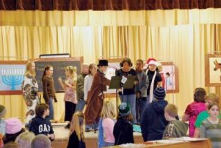 Fourth-graders at Marshall Elementary School Paint the Town December during the holiday pageant on Dec. 14. The seven-part musical celebrated Christmas