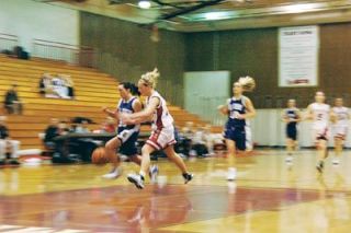 M-P guard Nicole Peterson tries to force a turnover on a Lake Stevens fast break. In the defensive game