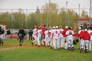 Sean Moser is congratulated after his two-run homer to center field in the bottom of an 11-run second inning rally. I was looking for that first-pitch fastball and I got it