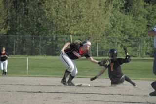 M-P senior Kristina Sherriff tags out Monroes Jordan Birch at second base in the Tomahawks 1-0 win.