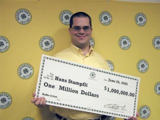 Hans Stampfli smiles as collects his winnings June 26. He had one of three winning tickets in Washington Lotterys Million