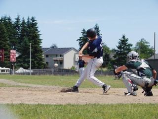 Ricky Holm connects for a second-inning single against the Timberjacks. Lately (hes) been hitting the heck out of the ball