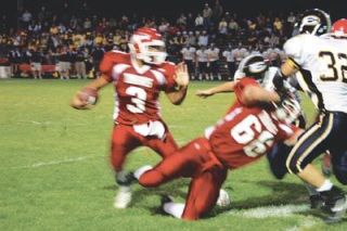 Quarterback Denay Stell breaks down the right side of the field. The senior led the Tomahawk rushing game with 139 of the teams 327 yards.