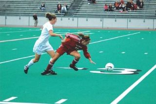 Sophomore forward Leslie James dives for the ball. James notched an assist and nearly a fourth team goal in the closing minutes of the Tomahawks 3-0 bruising of the Bruins.