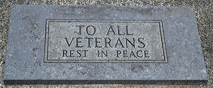 This head stone is under the flag at the Marysville Cemetery in honor of all veterans.