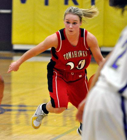 M-P senior guard Andi Adams takes the ball at the Lake Stevens defense.