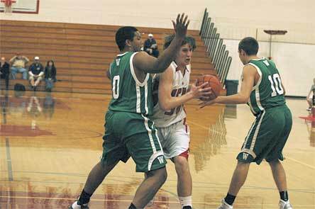 Marysville-Pilchuck sophomore Ryan Shannon drives through the lane