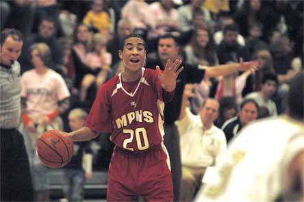 Dom Kiblinger directs traffic while bringing the ball up.