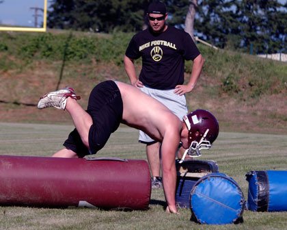 As Lakewood coach Dan Teeter watches