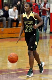 Marysville Getchell junior guard Khalyn King advances the ball downcourt against Stanwood on Dec. 2.