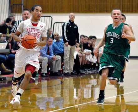 Marysville-Pilchuck senior guard Dominique Kiblinger looks to make a pass against Mount Vernon on Dec. 3.