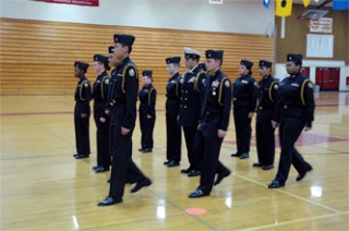 The Marysville-Pilchuck High School Naval Junior ROTC unarmed drill team performs at their Feb. 26 evening parade.