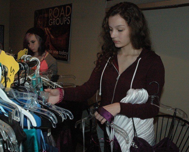 Kailee Olsen checks out the selection at the March 22 Prom Dress Exchange.