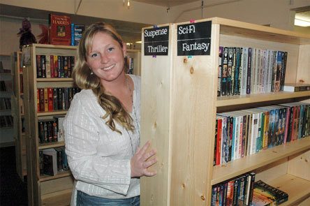 Sierra Cartwright shows off the shelves of 'Wit's End' used books