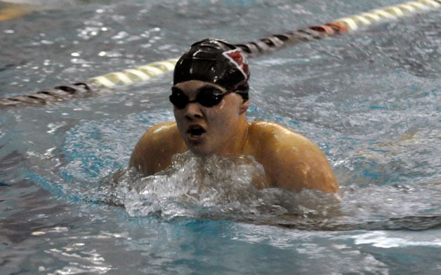 Marysville Pilchuck High School’s Thomas Durand launches his way through the 200-yard IM prelims in the Kamiak High School pool on Feb. 9.