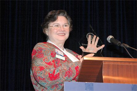 Karen Hume receives the Greater Marysville Tulalip Chamber of Commerce’s Volunteer of the Year award June 26.