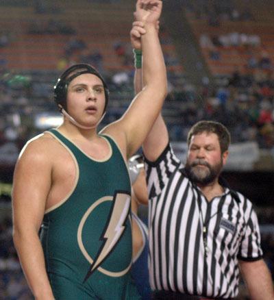 MG’s Alfredo Diaz is declared the winner of the semifinal match of the Mat Classic at the Tacoma Dome on Feb. 16.