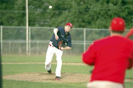 Senior pitcher Brennan Steinbaugh practices pick off plays.