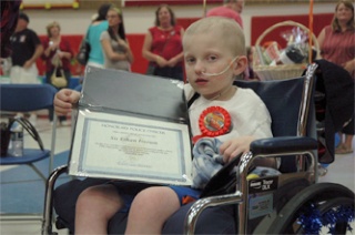 Ethan Iverson proudly shows off a certificate naming him an honorary Marysville Police Officer.