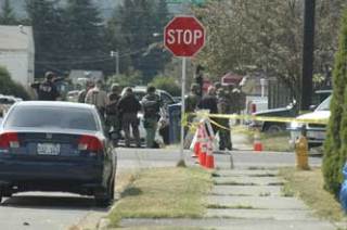 Members of the Snohomish County SWAT team arrive on the scene of an apparent standoff at a Marysville apartment near the intersection of Columbia Avenue and 9th.