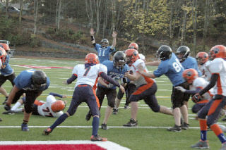 As Marysville Knights running back Hans Vanderwel’s foot crosses the goal line