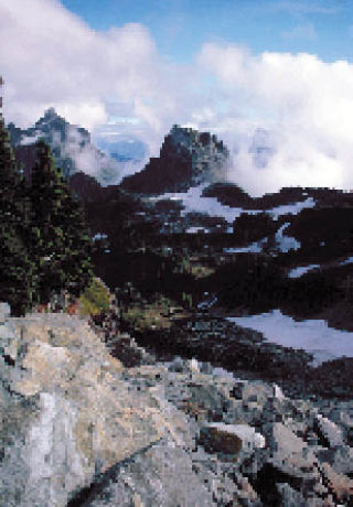 The mountain tops in Wild Sky Wilderness are filled with snow now