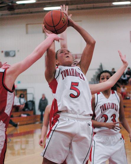 The lady Tomahawks lived around the basket