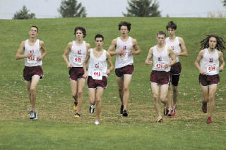 The Lakewood boys cross country team readies for the state meet at Sun Willows Golf Course in Pasco. From left