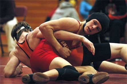 Tanner Bengen fights for controlling position against Granite Falls.