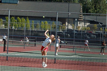 Highland Christian sophomore Sarah Tuemmler hits a serve.