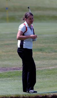 Senior Stasia Ashley smiles during round two at districts.