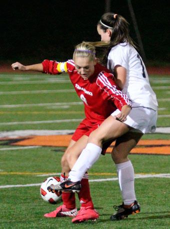 Tomahawk sophomore midfielder Mackenzie Nolte jockeys for possession of the ball during Marysville-Pichuck's Oct. 13 match against Monroe.