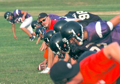 With his players lined up around him