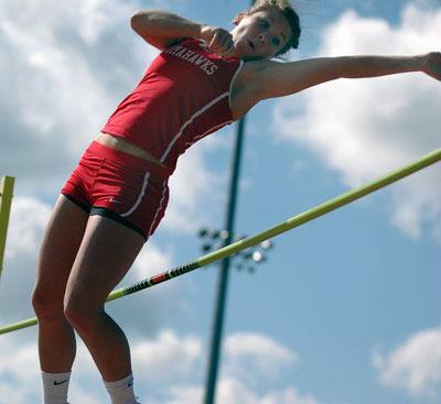 Marysville-Pilchuck pole vaulter Sarah Clark easily clears the bar. The senior won the event with her mark of 9-06.