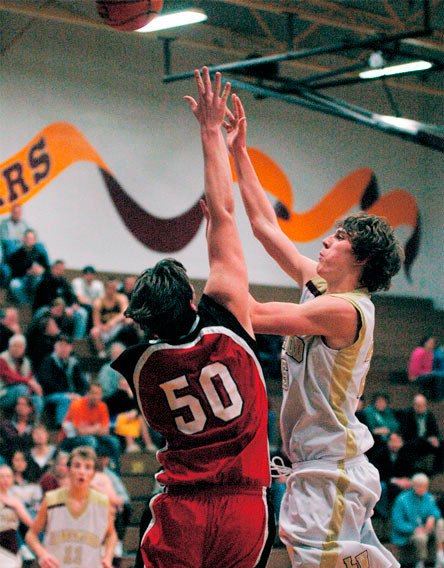 Junior forward Dustin Stanton tries a runner in the first half against Coupeville.