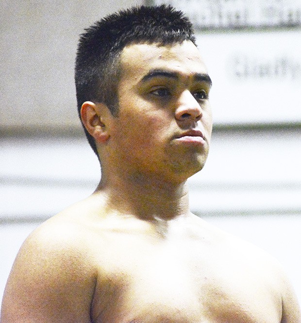 MG's Luis Pineda-Lopez prepares to execute a dive at a practice before state.