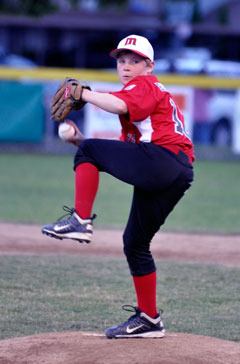 Marysville pitcher Cole Brammers winds up to deliver a pitch in the first round of the District 1 Little League 9-10-year-olds tournament Saturday