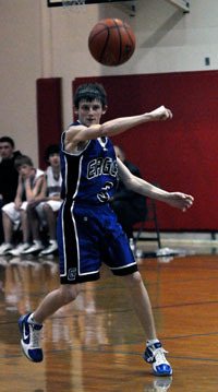 Grace’s Jordan Rock swings the ball around the perimeter against Highland Christian.