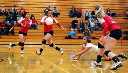 Libero Katie Peterson stretching for one of her 20 digs against Oak Harbor Oct. 20.