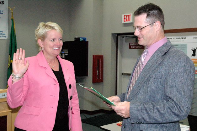 Dr. Becky Berg is sworn in as superintendent of the Marysville School District by Marysville School Board President Chris Nation on July 8