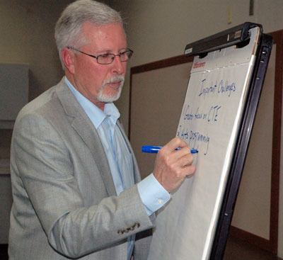 Marysville School Board member Pete Lundberg writes down input from community members during the district’s Jan. 31 forum on its search for a new superintendent.